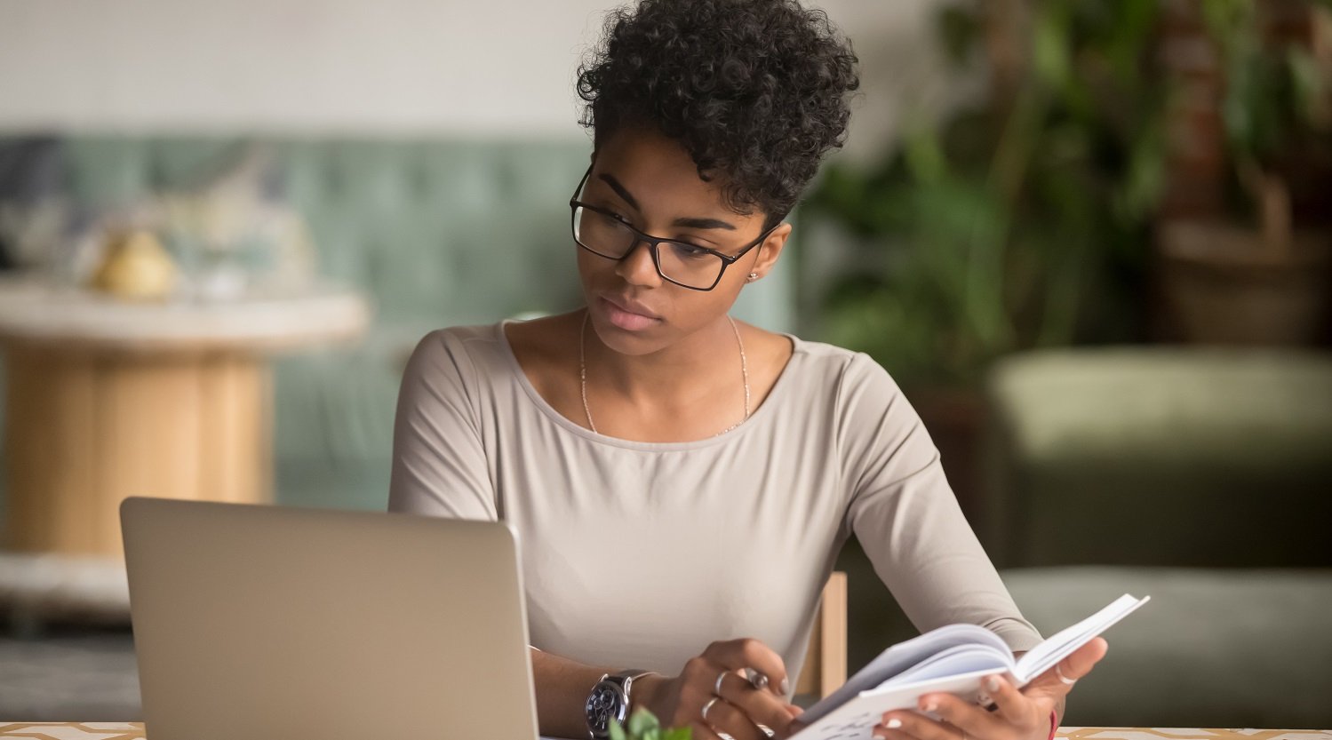 An employee reading a company handbook